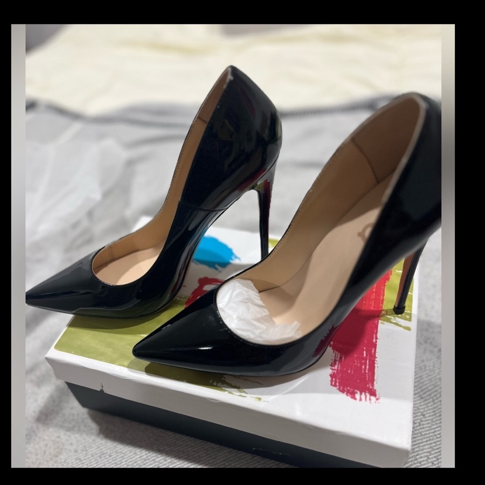 NWOT Never worn Black patent leather stilettos